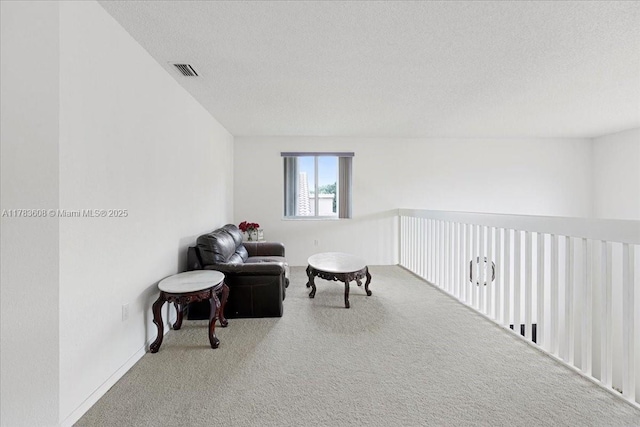 13063 NW 11th Ct, Sunrise, FL 33323 - living area with carpet, a textured ceiling, and baseboards