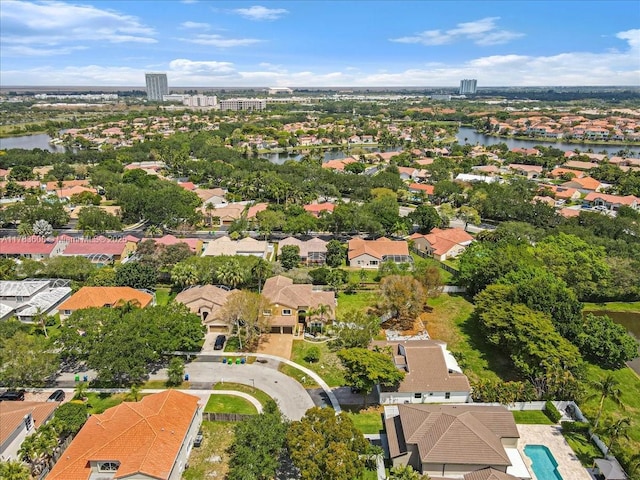 13063 NW 11th Ct, Sunrise, FL 33323 - aerial view of residential area with a large body of water