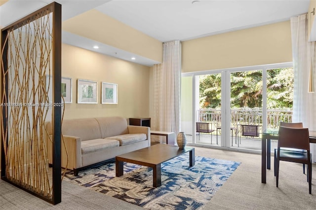 carpeted living room with recessed lighting