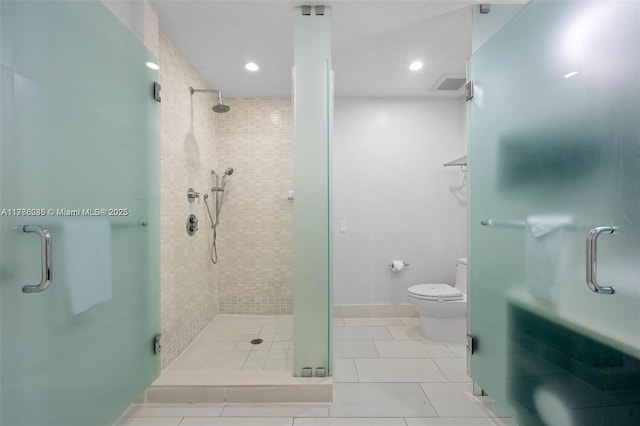 full bath featuring a shower stall, toilet, tile patterned flooring, and visible vents