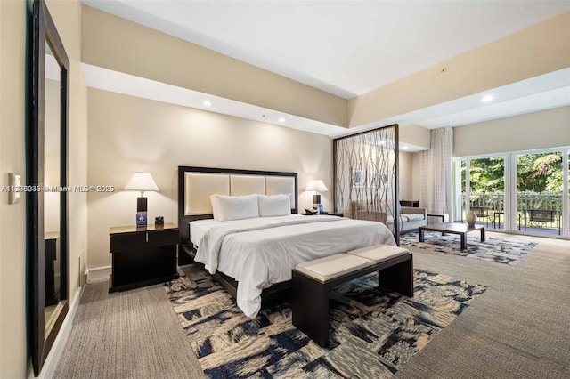 carpeted bedroom featuring recessed lighting