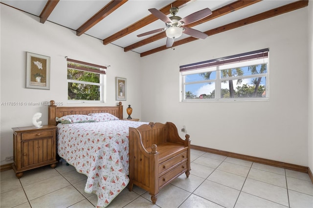 bedroom with beam ceiling, baseboards, ceiling fan, and light tile patterned floors