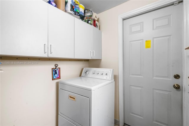 laundry area with washer / dryer and cabinet space
