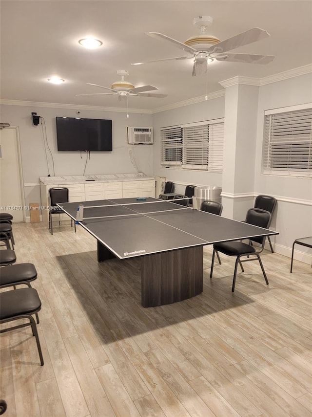 2900 Banyan St Unit 303, Fort Lauderdale, FL 33316 - rec room with a ceiling fan, ornamental molding, light wood-type flooring, and a wall mounted air conditioner