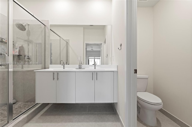 8292 NW 43rd St, Doral, FL 33166 - bathroom with double vanity, a shower stall, and tile patterned floors