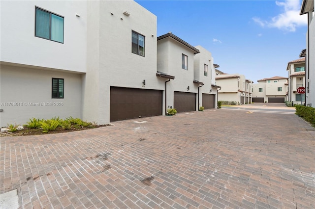 8292 NW 43rd St, Doral, FL 33166 - view of decorative road featuring a residential view and traffic signs