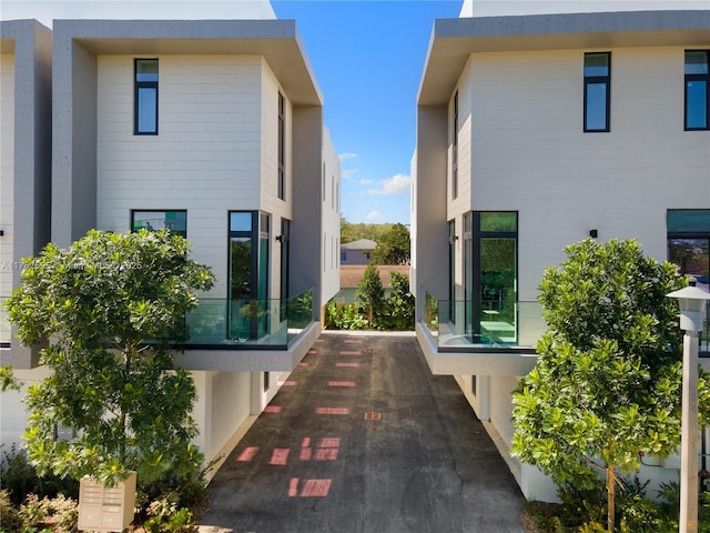 2501 SW 27th St Unit 6, Miami, FL 33133 - view of home's exterior featuring uncovered parking