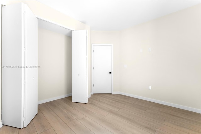 2501 SW 27th St Unit 6, Miami, FL 33133 - unfurnished bedroom featuring light wood-type flooring and baseboards