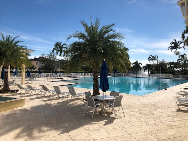 pool with a patio area