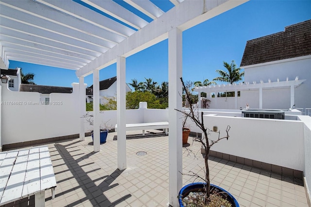 7765 SW 54th Ct Unit 7765, Miami, FL 33143 - view of patio with fence and a pergola
