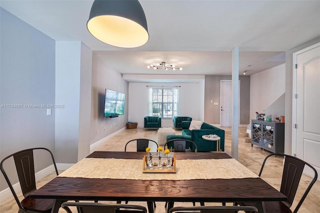 7765 SW 54th Ct Unit 7765, Miami, FL 33143 - dining area featuring baseboards