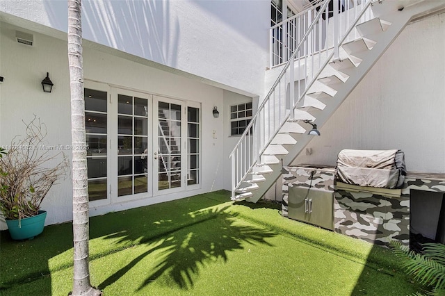 7765 SW 54th Ct Unit 7765, Miami, FL 33143 - exterior space with stairs and french doors