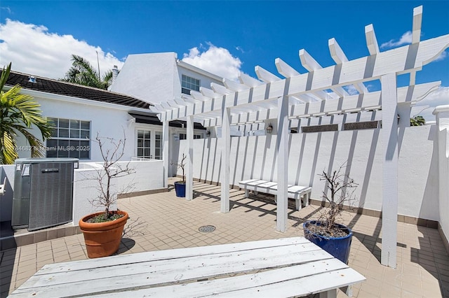 7765 SW 54th Ct Unit 7765, Miami, FL 33143 - wooden terrace featuring a pergola, fence, a patio area, and cooling unit