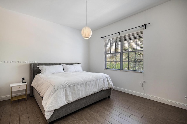 7765 SW 54th Ct Unit 7765, Miami, FL 33143 - bedroom with baseboards and wood finished floors