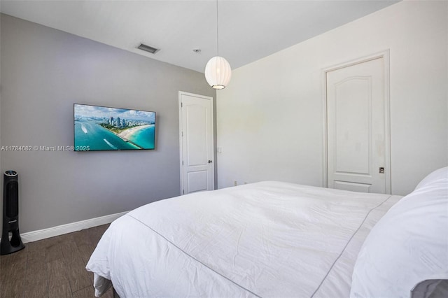 7765 SW 54th Ct Unit 7765, Miami, FL 33143 - bedroom with dark wood-style floors, baseboards, and visible vents