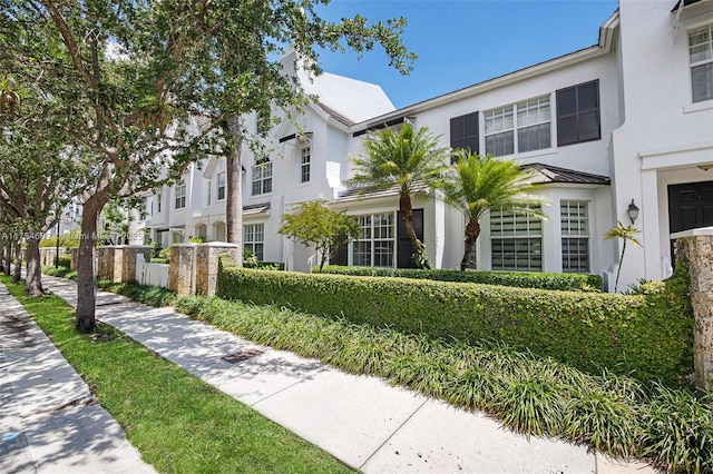 7765 SW 54th Ct Unit 7765, Miami, FL 33143 - townhome / multi-family property featuring a standing seam roof and stucco siding