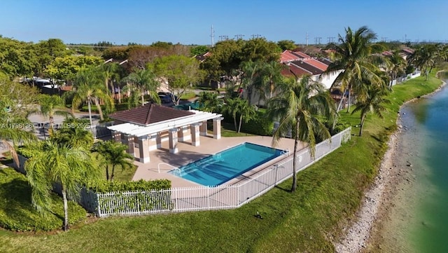 community pool with a gazebo, a patio, and a fenced backyard