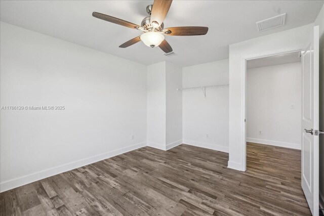 1909 NE 2nd Ave, Cape Coral, FL 33909 - unfurnished bedroom with wood finished floors, a closet, baseboards, and a ceiling fan