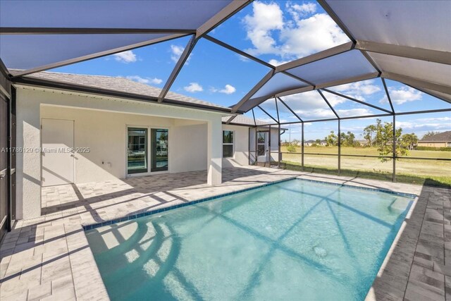 1909 NE 2nd Ave, Cape Coral, FL 33909 - swimming pool with a patio and a lanai