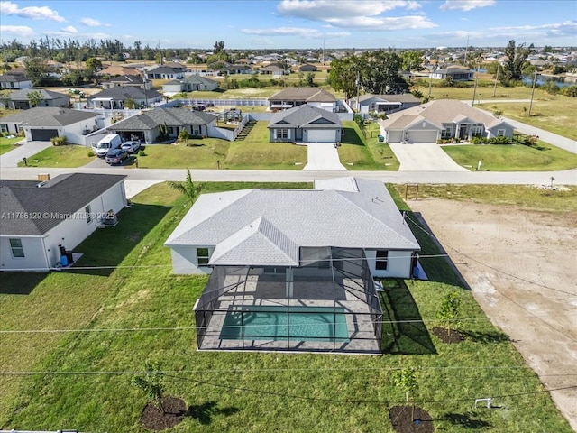 1909 NE 2nd Ave, Cape Coral, FL 33909 - aerial perspective of suburban area