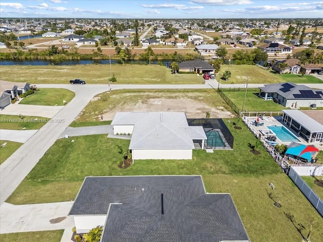 1909 NE 2nd Ave, Cape Coral, FL 33909 - aerial view of residential area with a nearby body of water