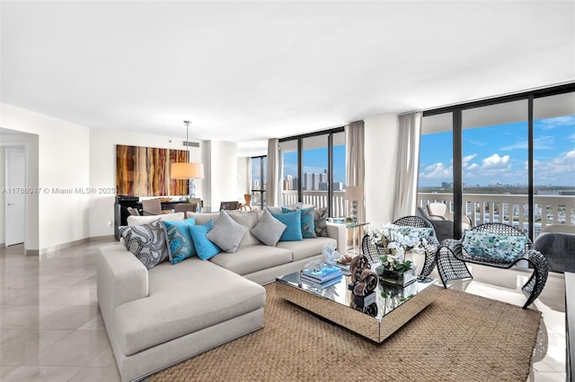 2000 Island Blvd Unit 1704, Aventura, FL 33160 - living area with tile patterned floors, plenty of natural light, and expansive windows