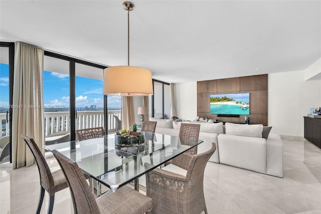 2000 Island Blvd Unit 1704, Aventura, FL 33160 - dining space featuring light tile patterned flooring and floor to ceiling windows