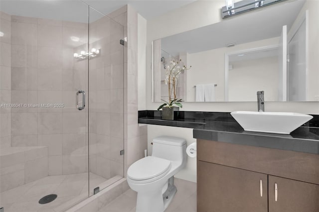 2000 Island Blvd Unit 1704, Aventura, FL 33160 - full bathroom with vanity, toilet, tile patterned flooring, and a stall shower