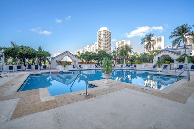 2000 Island Blvd Unit 1704, Aventura, FL 33160 - pool with a view of city and a patio