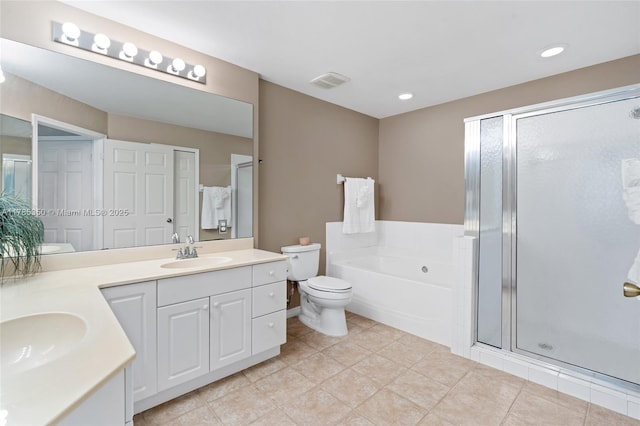 15161 Royal Windsor Ln Unit 2603, Fort Myers, FL 33919 - bathroom featuring a stall shower, toilet, a garden tub, double vanity, and tile patterned flooring