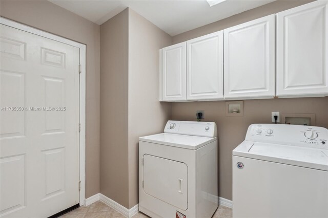 15161 Royal Windsor Ln Unit 2603, Fort Myers, FL 33919 - laundry room featuring cabinet space, separate washer and dryer, baseboards, and light tile patterned floors