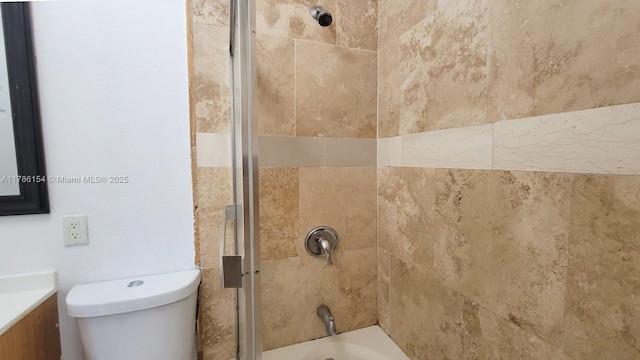 bathroom featuring tub / shower combination, toilet, and vanity