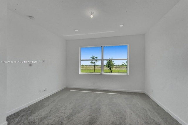 unfurnished room featuring baseboards, carpet, and recessed lighting
