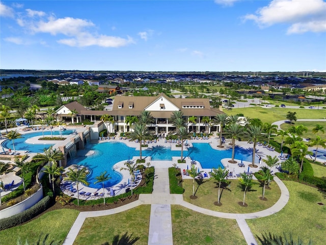 community pool with a patio