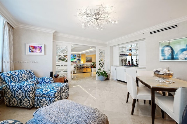 living room featuring a notable chandelier, visible vents, french doors, and crown molding