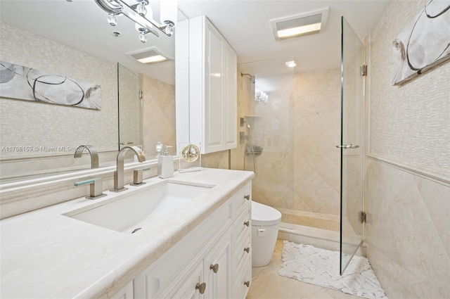 full bathroom featuring a stall shower, toilet, vanity, and visible vents