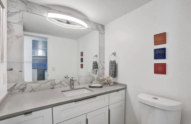 2200 NE 33rd Ave Unit 10F, Fort Lauderdale, FL 33305 - bathroom featuring toilet and vanity