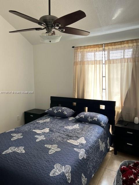 12045 SW 18th St Unit 1-42, Miami, FL 33175 - tiled bedroom with ceiling fan