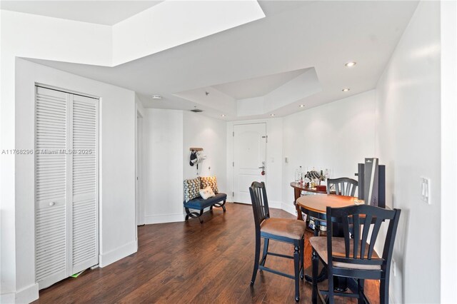 110 Washington Ave Unit 2307, Miami Beach, FL 33139 - dining space featuring a raised ceiling, dark wood finished floors, and recessed lighting