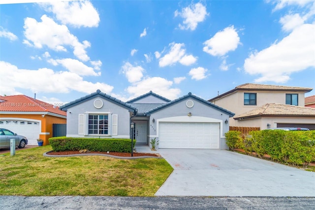 8612 SW 159th Pl, Miami, FL 33193 - view of front of property with a garage, stucco siding, concrete driveway, a front yard, and a tile roof