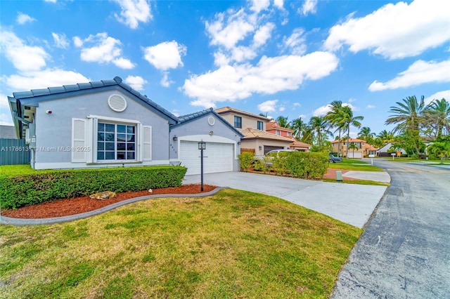 8612 SW 159th Pl, Miami, FL 33193 - view of front facade featuring concrete driveway, stucco siding, a front lawn, and a garage