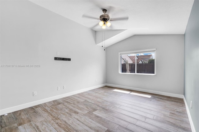 8612 SW 159th Pl, Miami, FL 33193 - empty room with ceiling fan, wood finished floors, and lofted ceiling