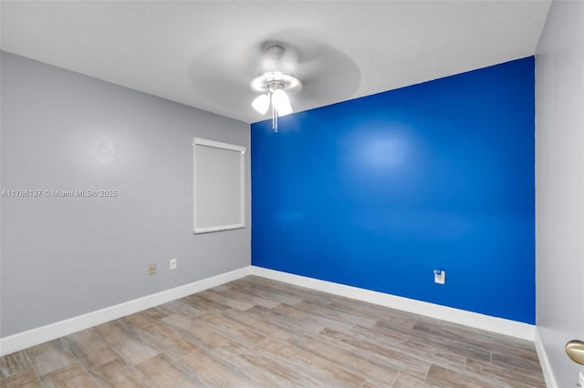 8612 SW 159th Pl, Miami, FL 33193 - empty room with a ceiling fan and wood finished floors