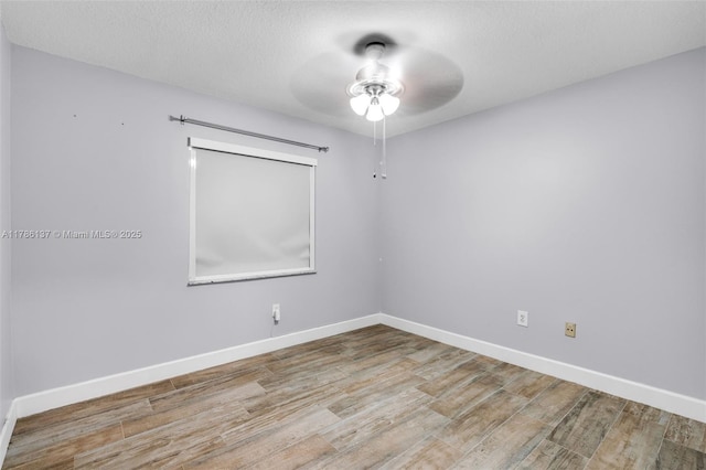 8612 SW 159th Pl, Miami, FL 33193 - empty room featuring a ceiling fan and wood finished floors
