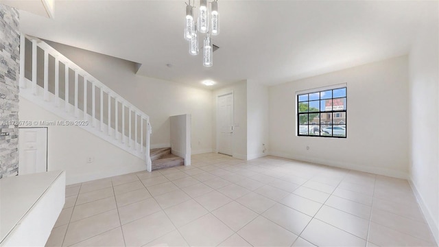 9231 W 32nd Ln, Hialeah, FL 33018 - spare room featuring stairway and light tile patterned floors