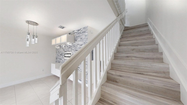 9231 W 32nd Ln, Hialeah, FL 33018 - staircase with tile patterned floors