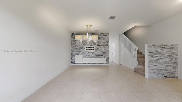 9231 W 32nd Ln, Hialeah, FL 33018 - unfurnished dining area featuring stairway and light tile patterned flooring