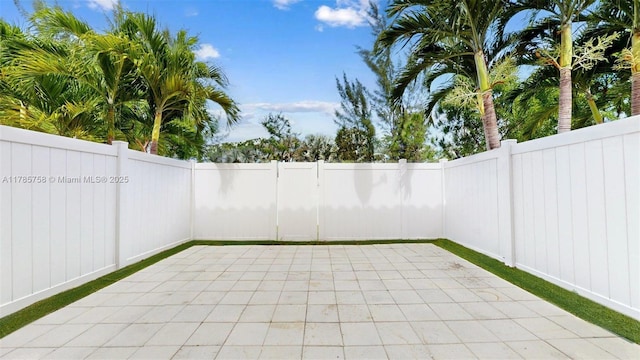 9231 W 32nd Ln, Hialeah, FL 33018 - fenced backyard featuring a patio area