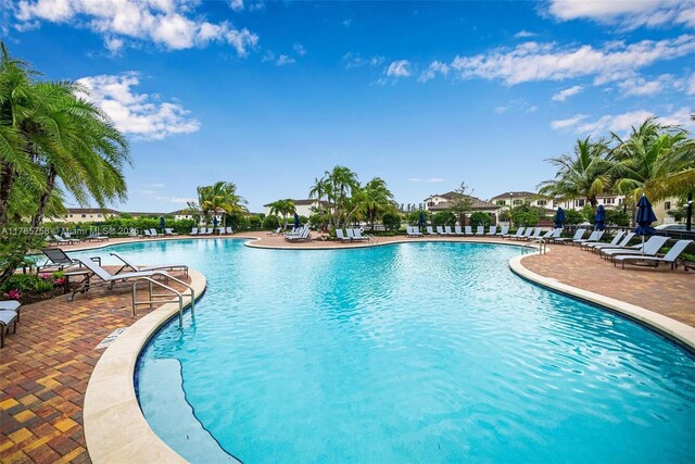 9231 W 32nd Ln, Hialeah, FL 33018 - community pool featuring a patio