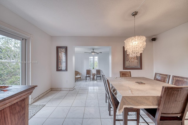 7215 SW 16th St, Miami, FL 33155 - dining room featuring baseboards and ceiling fan with notable chandelier
